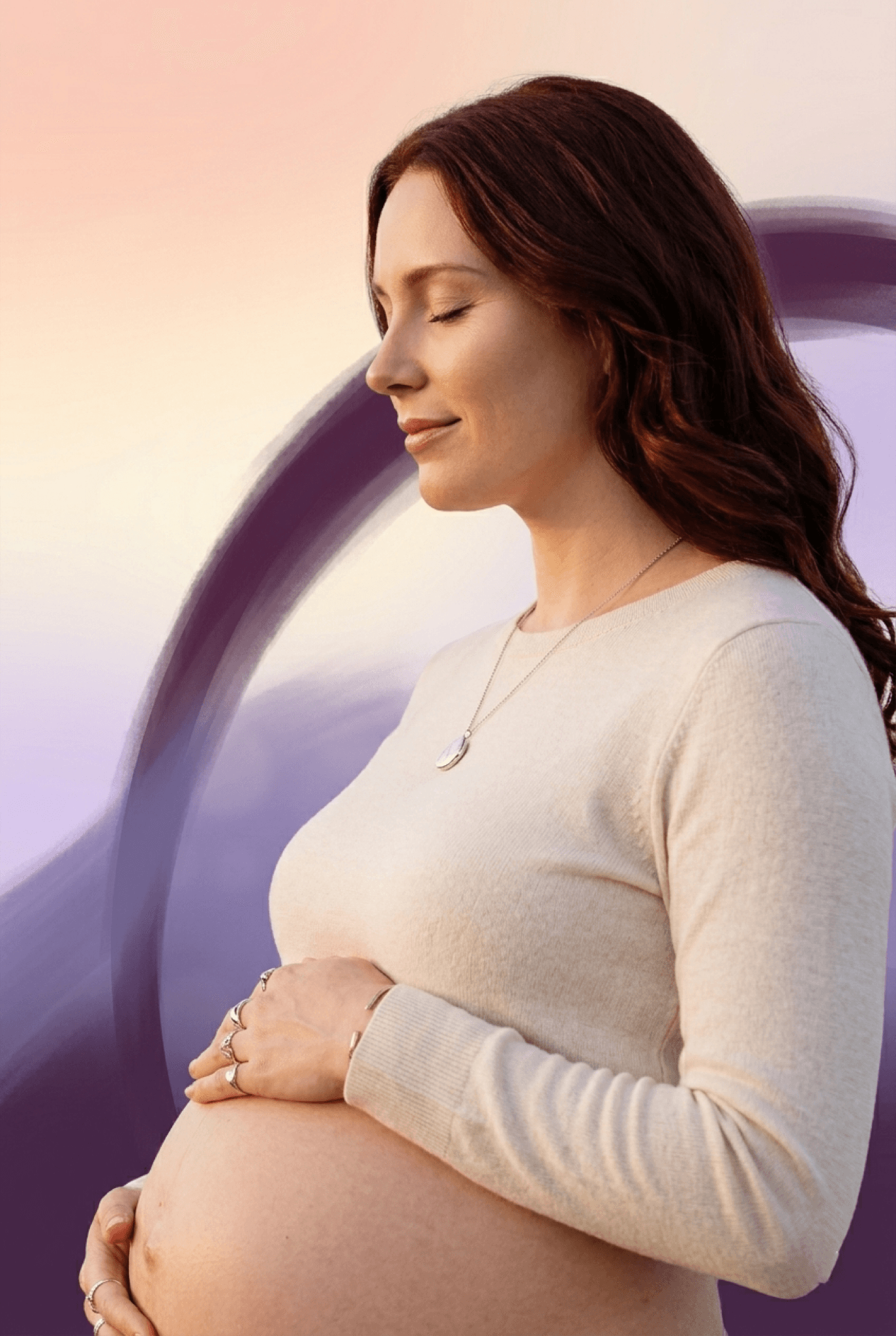 Pregnant woman peacefully cradling her belly